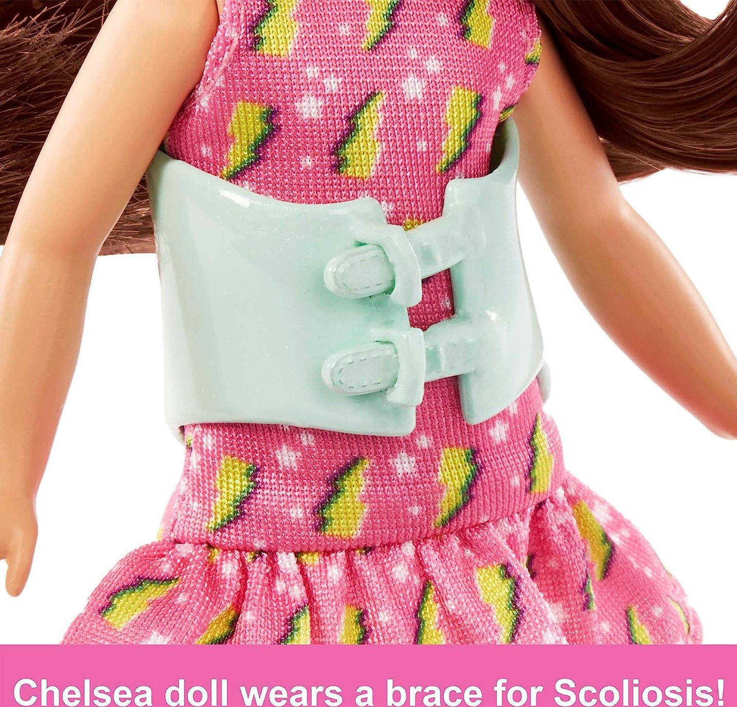 Barbie Toys, Chelsea Doll, 6-Inch Small Doll with Brace for Scoliosis Spine Curvature, Brunette Wearing Pink Lightning Bolt Dress