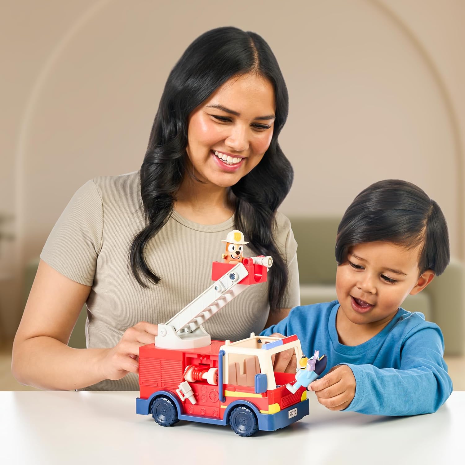 Bluey Firetruck, Firetruck with Bluey, Exclusive Firefighter Bingo and Bob Bilby Figures Raise The Ladder, Spin It Around and Roll Out The Hose Includes Sticker Sheet
