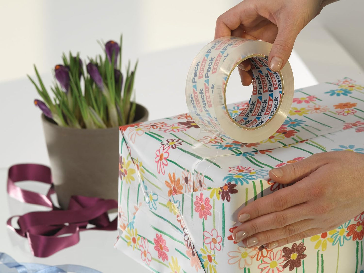 tesa Pack EXPRESS Packaging Tape - Hand Tearable Self-adhesive Roll for Fast Packaging of Parcels and Gifts - 50 m x 50 mm - Transparent Clear 50m x 50mm