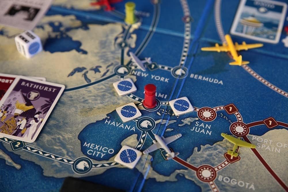 PAN AM Fun Strategy Board Game For The Whole Family - Includes 52 Airplane Miniatures From 4 Distinct Airline Eras (Ages 12+) Ideal for 2-4 Players - Funko 48719 Signature Games