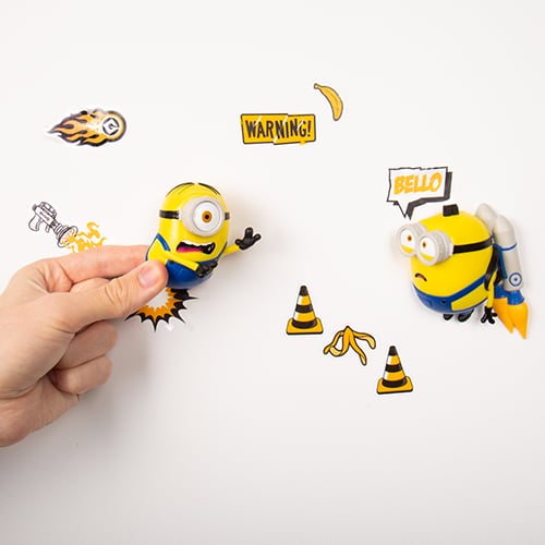 Minions Comic Ons. Collectible Figurines with Vinyl Stickers. 2 Wall Mountable 3D Figures with Re-Usable Gel Pads. Features Stuart & Otto. Officially Licensed Minions Merchandise.