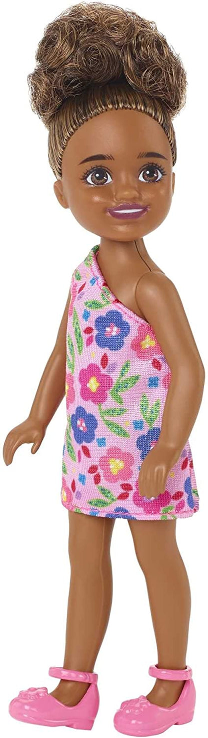 Barbie Chelsea Doll (Brunette Curly Hair) Wearing One-Shoulder Flower-Print Dress and Pink Shoes, Toy for Kids Ages 3 Years Old & Up
