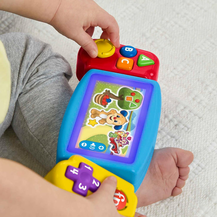 Fisher-Price HNL51 - Learning Fun Video Game Dummy Children's Toy with Lights and Sounds as Well as Learning Songs, Toy for Fine Motor Skills Twist & Learn Game Console, Multilingual Version