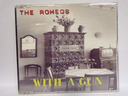 With a gun