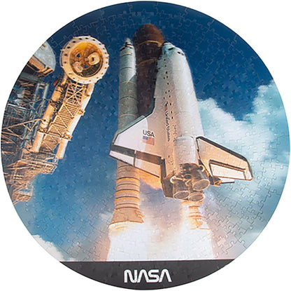 NASA Lenticular Puzzle. 500 Piece NASA Inspired Space Shuttle 3D Lenticular Jigsaw Puzzle. Circular Shaped with Moving 3D Effect. NASA Inspired Merchandise from Fizz Creations.