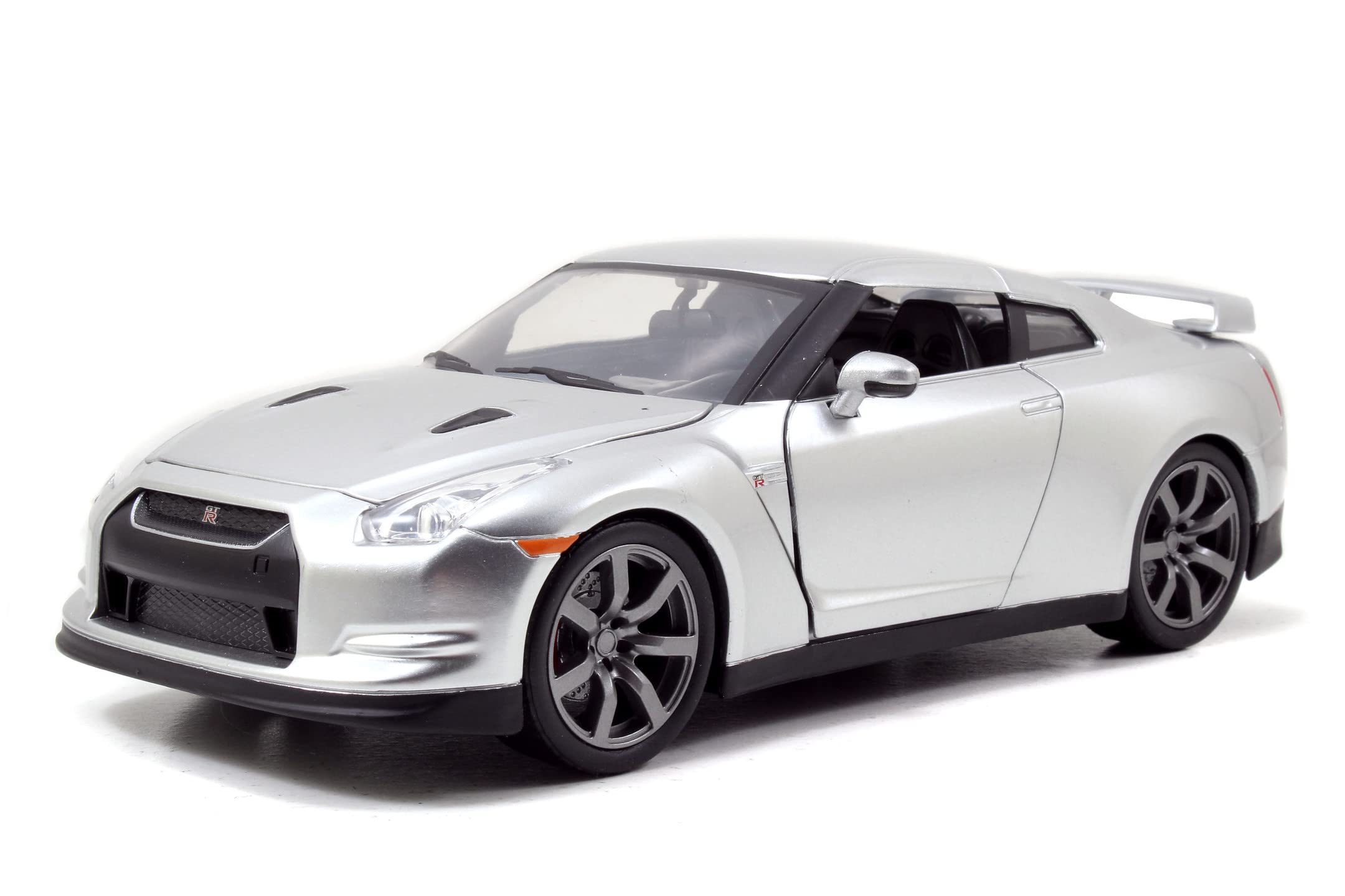 Jada Toys - Modellino auto Fast and Furious 1:24 - Brian`s Nissan GT-R R35 (argento) in Fast & Furious, la Cast Auto di Brian O`Conner con parti apribili, 19 cm, a partire da 8 anni