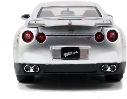 Jada Toys - Modellino auto Fast and Furious 1:24 - Brian`s Nissan GT-R R35 (argento) in Fast & Furious, la Cast Auto di Brian O`Conner con parti apribili, 19 cm, a partire da 8 anni
