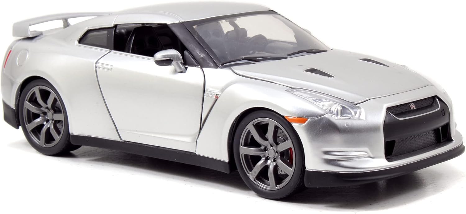 Jada Toys - Modellino auto Fast and Furious 1:24 - Brian`s Nissan GT-R R35 (argento) in Fast & Furious, la Cast Auto di Brian O`Conner con parti apribili, 19 cm, a partire da 8 anni