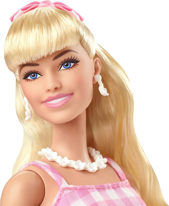 Barbie The Movie Doll, Margot Robbie as Barbie, Collectible Doll Wearing Pink and White Gingham Dress with Daisy Chain Necklace, HPJ96