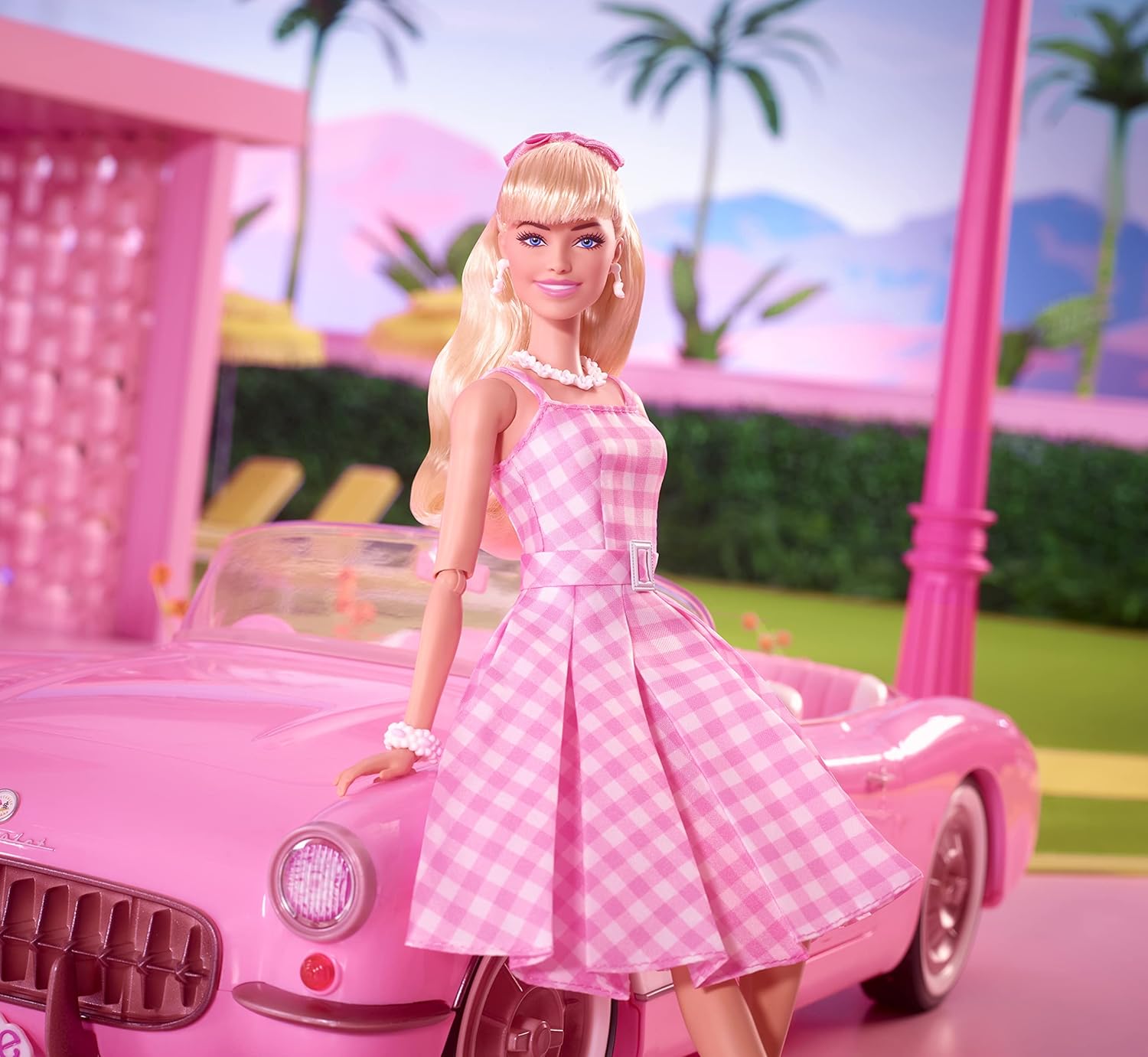 Barbie The Movie Doll, Margot Robbie as Barbie, Collectible Doll Wearing Pink and White Gingham Dress with Daisy Chain Necklace, HPJ96