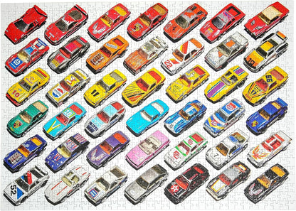Well Played / 1,000 Piece Jigsaw Puzzle for Adults from Happily | featuting diecast toy cars from the 80s & 90s | Retro Adult Jigsaw Puzzle