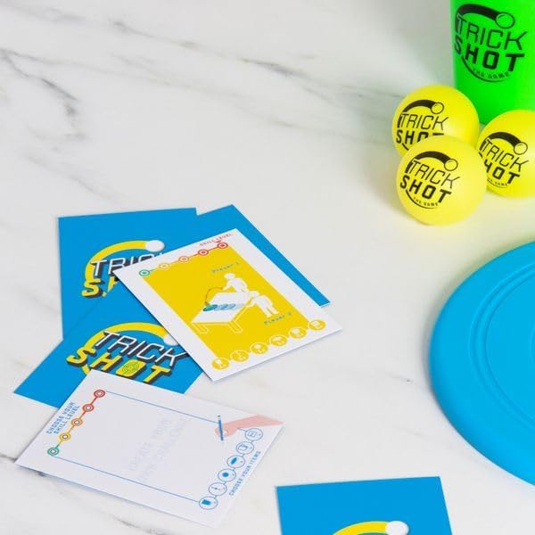 Fizz Creations Trick Shot The Game. Includes All You Need to Practice the Perfect Shot! Includes Stacking Cups, Ping Pong Balls, Sticky Darts, Throwing Disc & Challenge Cards.