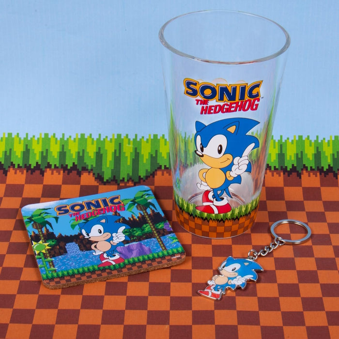 Fizz Creations Sonic The Hedgehog Keyring, Glass and Coaster Gift Set. 3 in 1 Gift Set. 480ml Capacity Drinking Glass. Officially Licensed Retro Games Sonic The Hedgehog Merchandise.