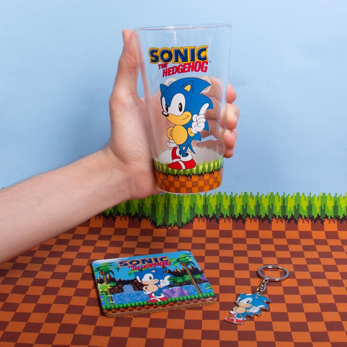 Fizz Creations Sonic The Hedgehog Keyring, Glass and Coaster Gift Set. 3 in 1 Gift Set. 480ml Capacity Drinking Glass. Officially Licensed Retro Games Sonic The Hedgehog Merchandise.