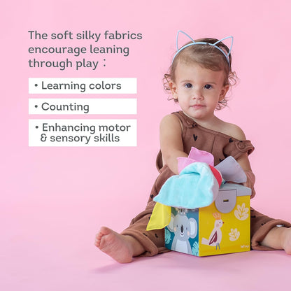 Taf Toys Wonder Baby Tissue Box Toy for Infants & Toddlers. Baby Sensory Box. Tummy Time Toy Colourful Pull Scarves & Crinkling Blankies. Educational Learning Toy. Suitable for Boys & Girls 9 months +