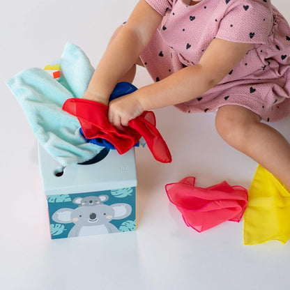 Taf Toys Wonder Baby Tissue Box Toy for Infants & Toddlers. Baby Sensory Box. Tummy Time Toy Colourful Pull Scarves & Crinkling Blankies. Educational Learning Toy. Suitable for Boys & Girls 9 months +
