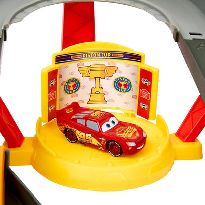 Disney and Pixar Cars Track Set, Piston Cup Action Speedway Playset with 1:55 Scale Lightning McQueen Die-Cast Toy Car, HPD81