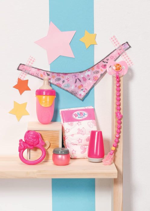 Baby Born Starter Set 832851 - Accesories Dolls for Toddlers - Includes Magic Eyes Dummy & Dummy Chain, Nappy, Ring Toy, Powder Bottle, Cream Tube, Bottle & Neckerchief