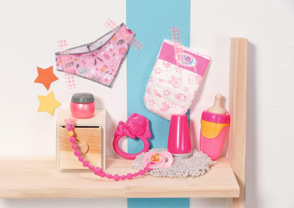 Baby Born Starter Set 832851 - Accesories Dolls for Toddlers - Includes Magic Eyes Dummy & Dummy Chain, Nappy, Ring Toy, Powder Bottle, Cream Tube, Bottle & Neckerchief