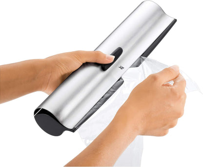 WMF Gourmet Folienschneider mit gezahntem Metaldeckel 32 cm, Cromargan Edelstahl, geeignet für Frischhalte-, Alufolie oder Back- Butterbrotpapier ab Single