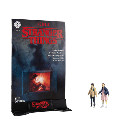 McFarlane Toys - Stranger Things Page Punchers, 2 Unidades, Figuras de acción de Eleven y Mike Wheeler de 3 Pulgadas con cómic