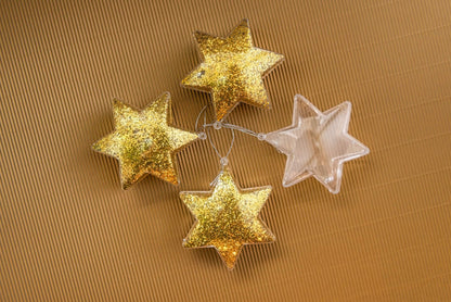 CLEAR STAR ORNAMENTS - PACK OF 12