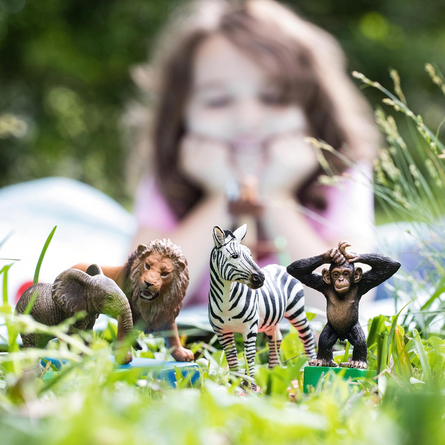 schleich WILD LIFE - Starter Set, Includes 4 x Collectable Toy Animals, Zebra, Lion, Baby African Elephant and Infant Chimpanzee Animals Toys for Kids aged 3+