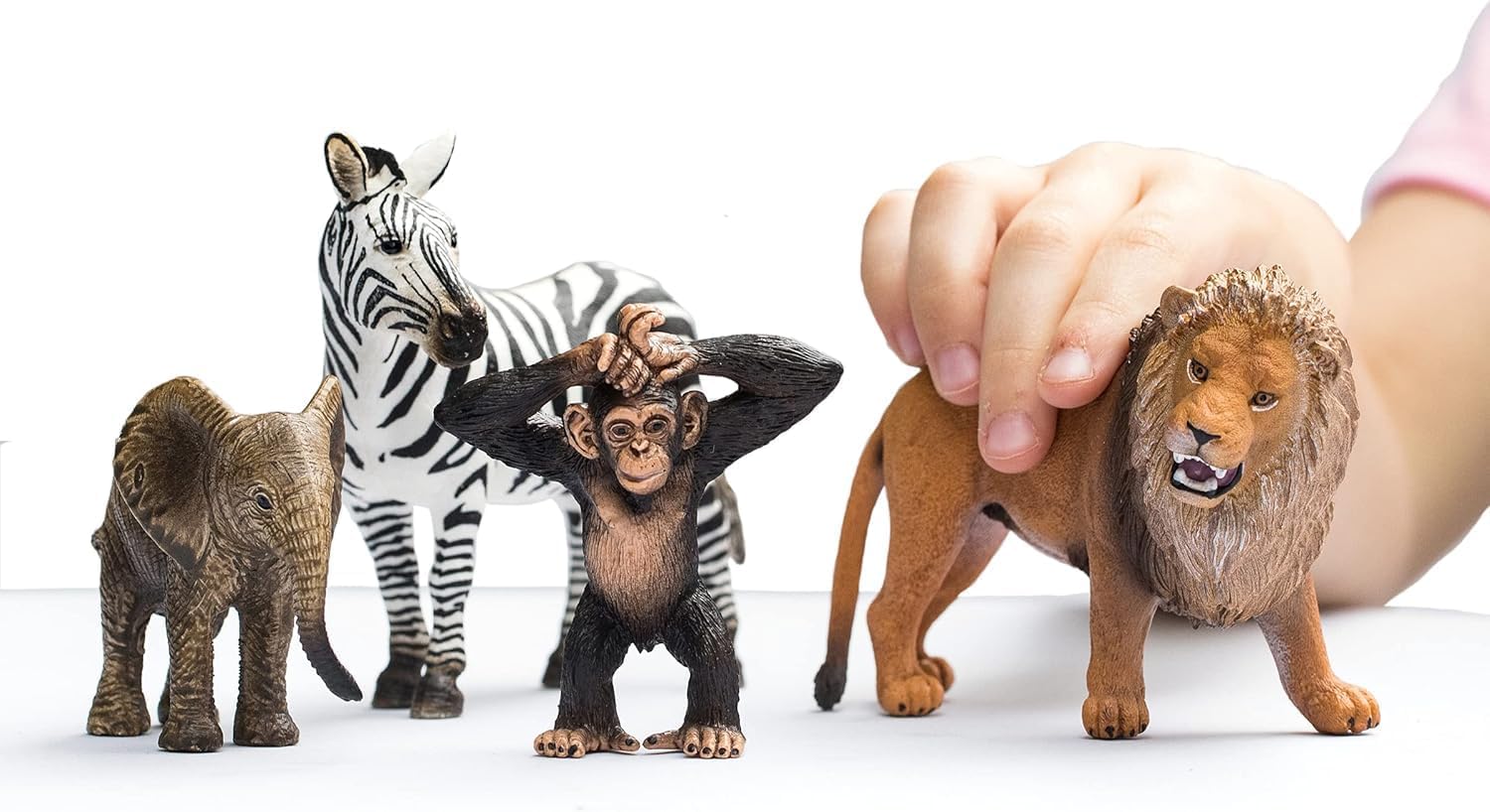 schleich WILD LIFE - Starter Set, Includes 4 x Collectable Toy Animals, Zebra, Lion, Baby African Elephant and Infant Chimpanzee Animals Toys for Kids aged 3+