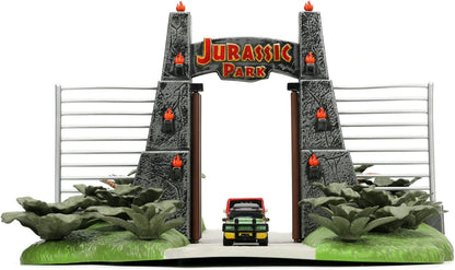 Jada- Jurassic Park Nanoescenario Puerta de Parque Jurásico, Especial 30 Aniversario de la Película Original, Con 2 Nanovehículos Metálicos de 4cm y 3 Dinosaurios (253252028)