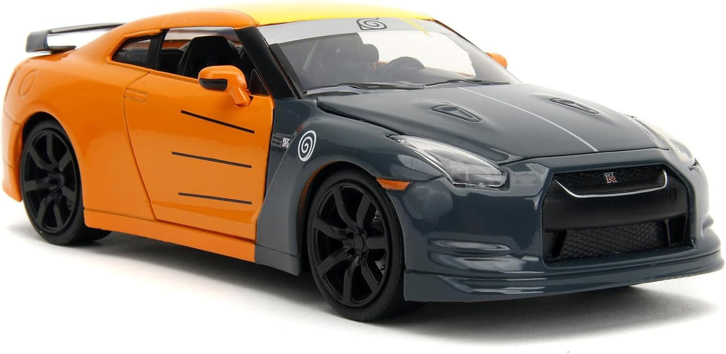 Jada- Naruto Coche Nissan GT-R 1:24 die-cast, rueda libre, apertura de puertas, capó, maletero, figura de Naruto die-cast (253255054