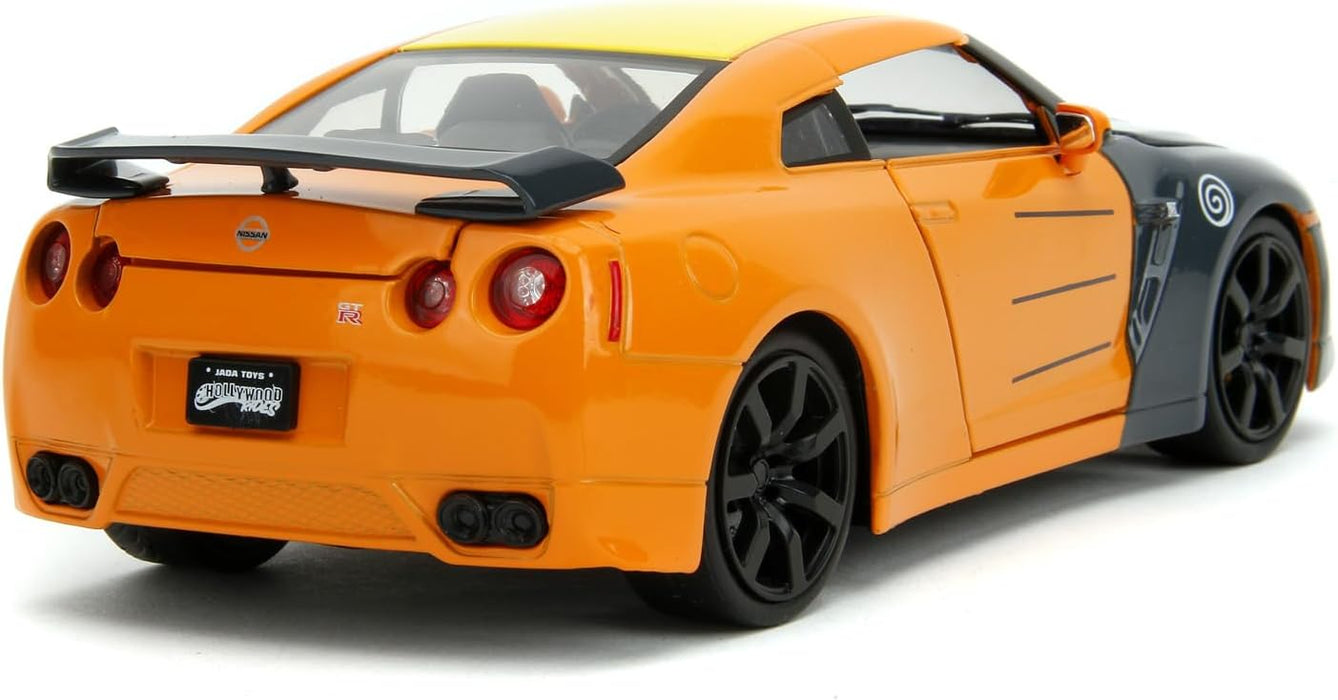 Jada- Naruto Coche Nissan GT-R 1:24 die-cast, rueda libre, apertura de puertas, capó, maletero, figura de Naruto die-cast (253255054