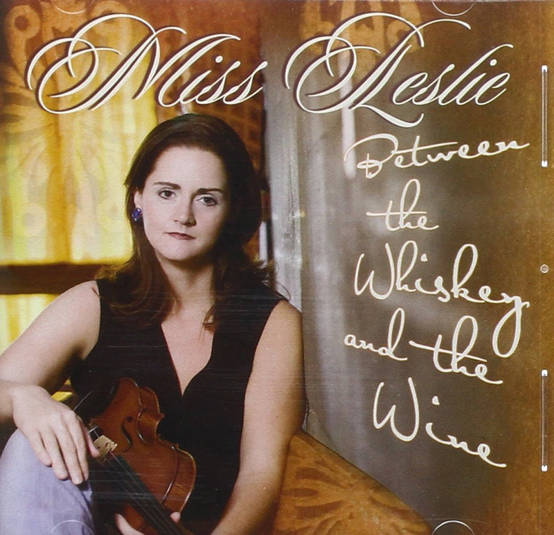 Miss Leslie & Her Juke-Jointers - Between The Whiskey And The Wine