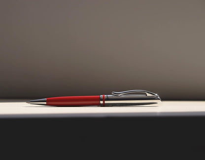 Pelikan elegante Bolígrafo metálico Linea Jazz, clip elástico y mecanismo giratorio, cuerpo rojo y plata, tinta Pelikan negra - 0F0R60