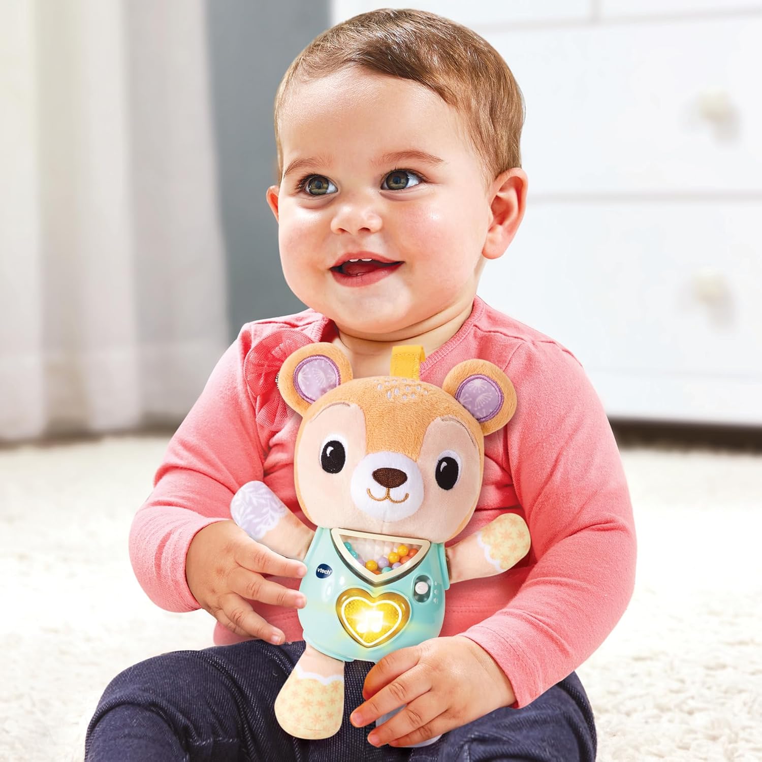 VTech Teddy Orsetto Canterino, Orsetto Interattivo con più di 40 Canzoni e Melodie, Cuoricino Luminoso e Perline Colorate per una Stimolazione Sensoriale, Lingua Italiana, Batterie Incluse, 3-18 Mesi