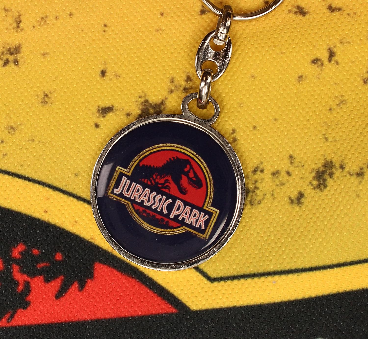 SD TOYS- Llavero Redondo Logo pelicula Jurassic Park, Color Negro (Carat SDTUNI25366