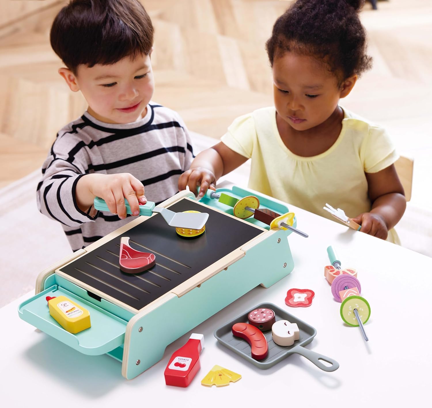 Hape Sissende grill en barbecue
