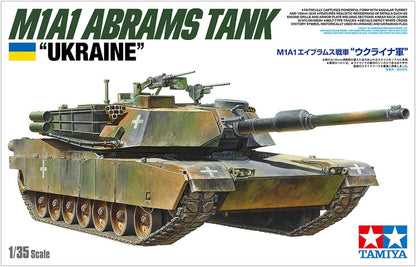 TAMIYA 25216 1:35 US M1A1 Abrams Ukraine Model, Plastic, Assembly, Detailed Replica, Tank Kit, Geformte Farbe