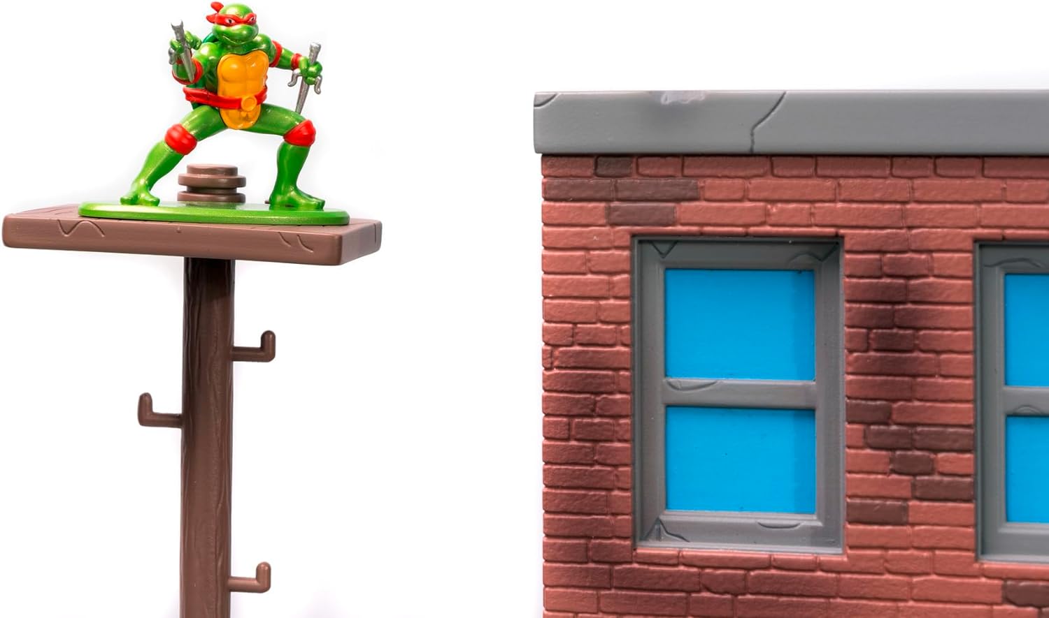 Jada Toys Ninja Turtles Nano Scene Turtle Lair (30 x 25 cm) - Telón de Fondo para coleccionar Figuras de Juguete (Incluye 4 Tortugas Ninja Mutantes Adolescentes de Metal y Accesorios de Juego, a