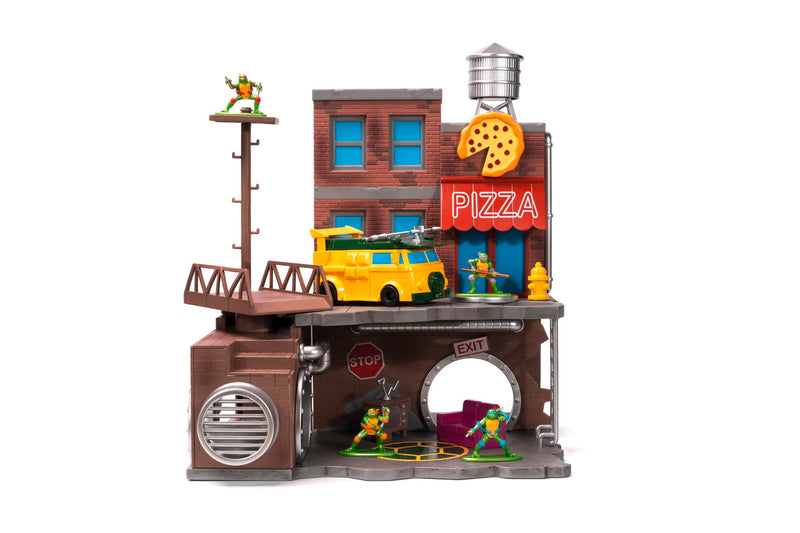 Jada Toys Ninja Turtles Nano Scene Turtle Lair (30 x 25 cm) - Telón de Fondo para coleccionar Figuras de Juguete (Incluye 4 Tortugas Ninja Mutantes Adolescentes de Metal y Accesorios de Juego, a