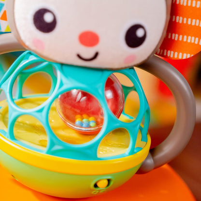 Bright Starts, Juguete sonajero Luminoso y Musical fcil de agarrar Giggle Monkey, tecnologa Oball, para Edades a Partir de 6 Meses, Unisex