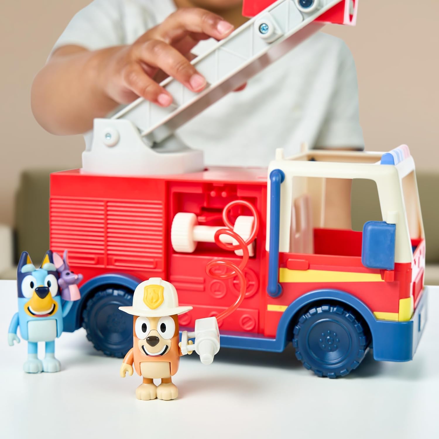 Bluey Firetruck, Firetruck with Bluey, Exclusive Firefighter Bingo and Bob Bilby Figures Raise The Ladder, Spin It Around and Roll Out The Hose Includes Sticker Sheet