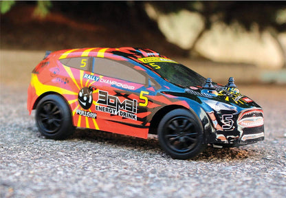Nincoracers - X Rally Bomb Coche Teledirigido a Escala 1/30 | hasta 12km de Velocidad | Coche Radiocontrol con Mando a Distancia 2.4 GHz | A Partir de 6 años. (NH93142