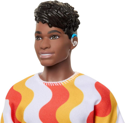 Barbie Fashionistas Ken Doll #220 with Behind-the-Ear Hearing Aids & Broad Body Wearing a Removable Orange Patterned Shirt, Shorts & Jelly Sandals, HRH23