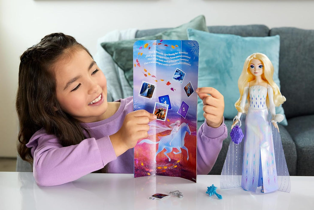 Mattel Disney Frozen Elsa Spin And Reveal Muñeca princesa que revela sorpresas y accesorios, juguete +3 años (HTG25