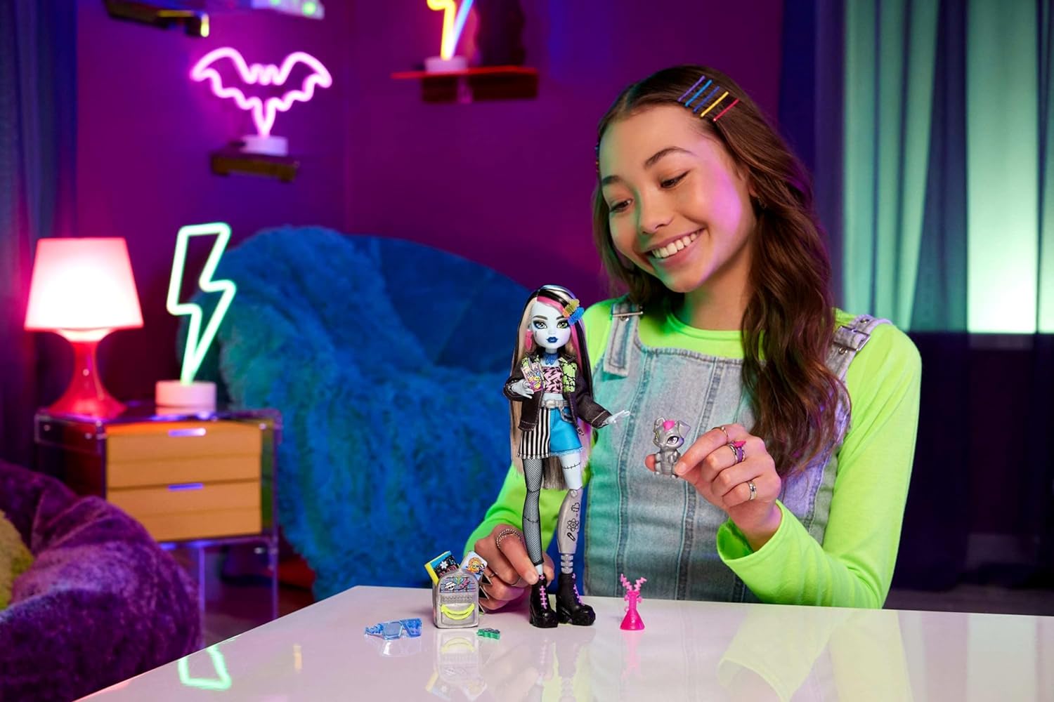 Monster High Frankie Stein Doll in Denim Jacket and Shorts, Includes Pet Dog Watzie and Accessories like a Backpack, Snack and Notebook, HXH73