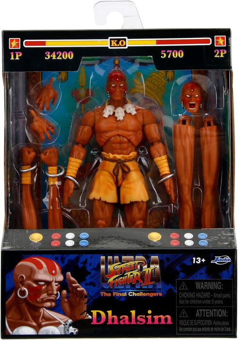 Jada - Street Fighter 2- Figura articulada de Dhalsim de 15 cm. con Manos y Cabeza Intercambiables, Accesorios y 20 Puntos articulados. A Partir de 13 años (253252031