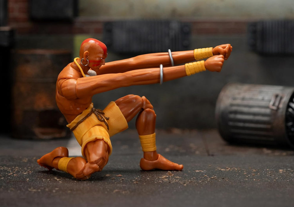 Jada - Street Fighter 2- Figura articulada de Dhalsim de 15 cm. con Manos y Cabeza Intercambiables, Accesorios y 20 Puntos articulados. A Partir de 13 años (253252031