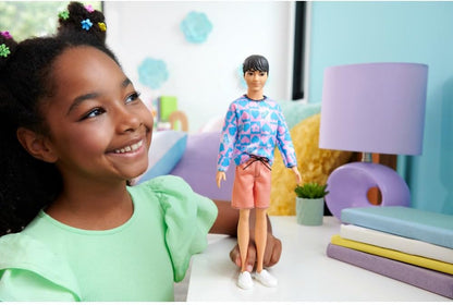 Barbie Fashionistas Ken Doll #219 with Slender Body Wearing a Removable Long-Sleeve Pink & Blue Patterned Shirt & Pink Shorts, HRH24