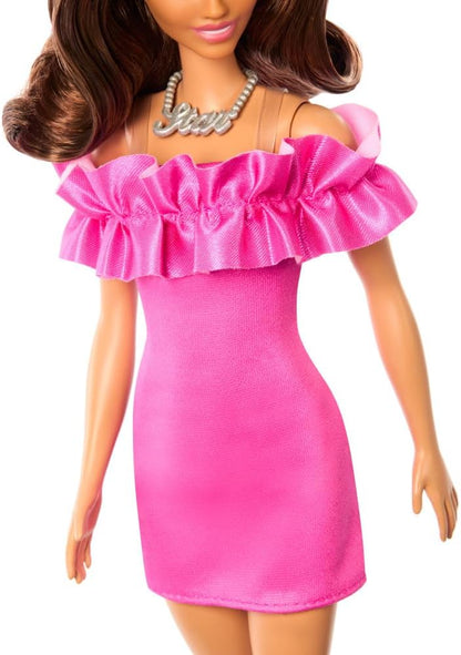 Barbie Fashionistas Muñeca n. 217, muñeca de Moda Coleccionable del 65. Aniversario con Pelo Ondulado castaño semirrecogido y Vestido Rosa - para niños y niñas + 3 años, HRH15