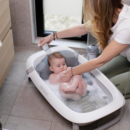 Twistshake Non-Slip Baby Bath Cushion for Newborns | Soft and Foldable Shower Cushions for Infants | Floating Air Cushion for Bathing Babies | 0 Months+ | Pastel Grey